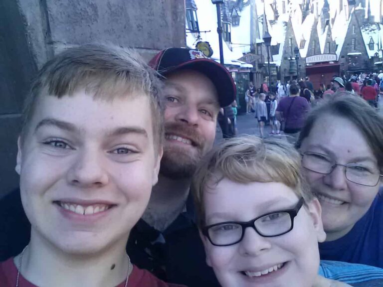 The Purposeful Pantry Family in front of Hogsmeade Village at Wizarding World of Harry Potter