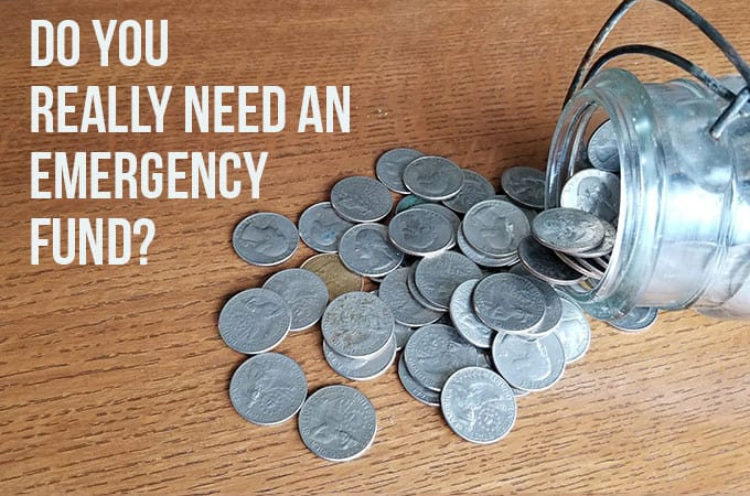 jar of quarters on table - emergency fund - with text "Create an emergency fund"