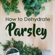 parsley bunch on a cutting board with text "How to Dehydrate Parsley by The Purposeful Pantry.com"