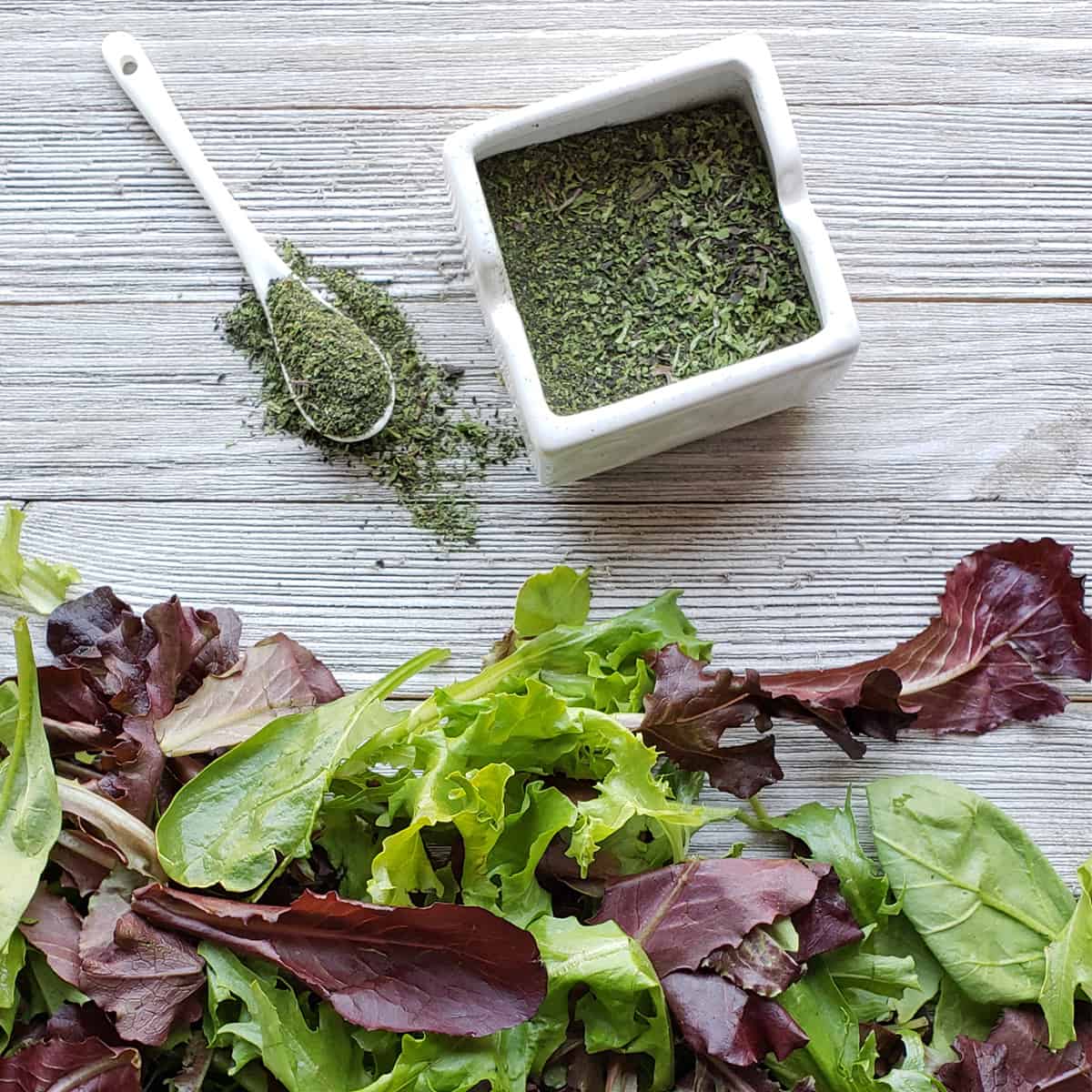 Dehydrated lettuce and fresh lettuce on wooden background preparing to dry