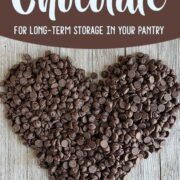 Chocolate chips formed in the shape of a heart on a wooden background with the text How to Store chocolate