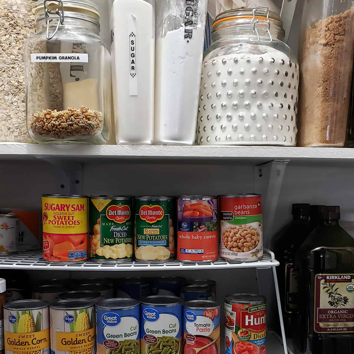 Pantry shelves stocked with food