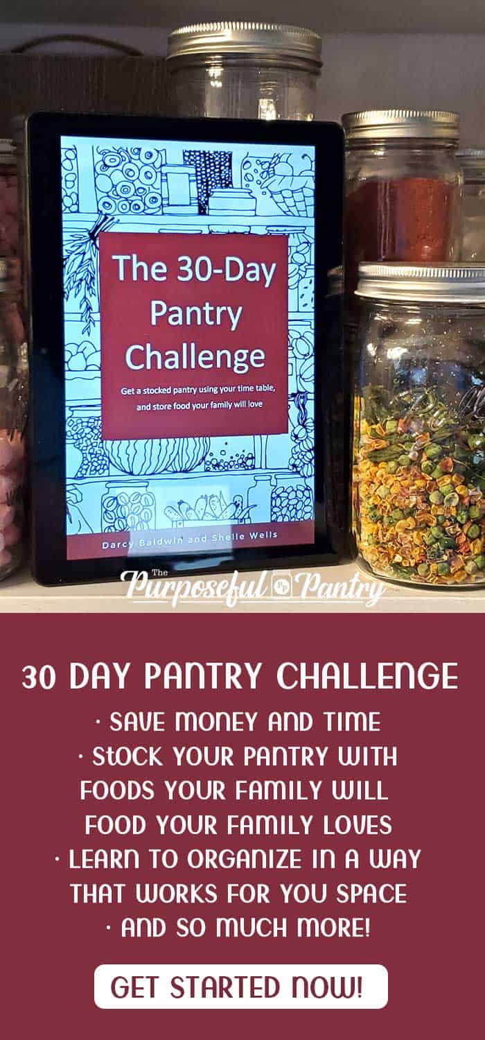 30 Day Pantry Challenge ebook loaded on a tablet sitting on pantry shelf