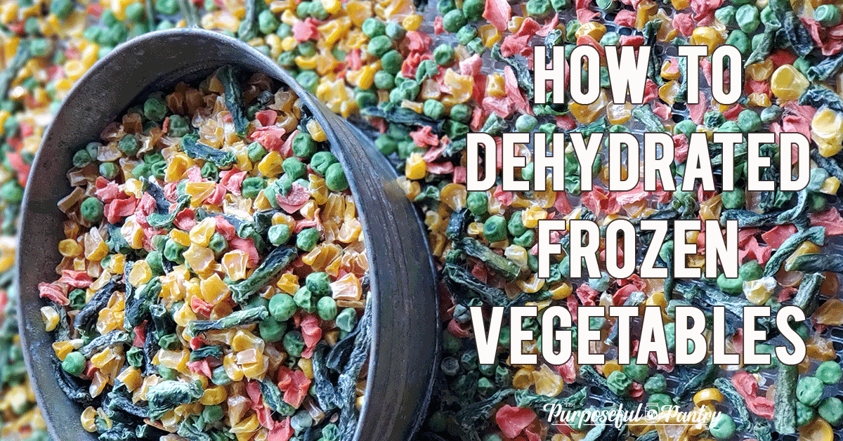 Silver dish full of dehydrated vegetables on an Excalibur Dehydrator tray