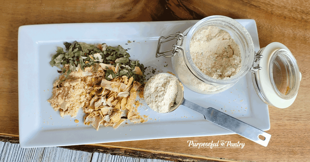 White diplay tray with DIY French Onion Dip Powder mix ingredients and final powder in a jar.
