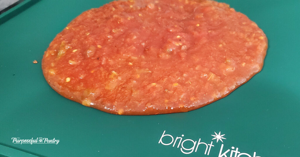 Picante Sauce on a Green Silicone Pad to dehydrate