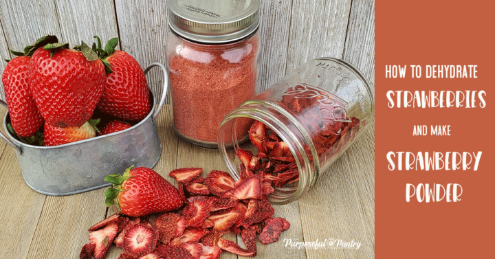 Strawberries and dried strawberries on a wooden background