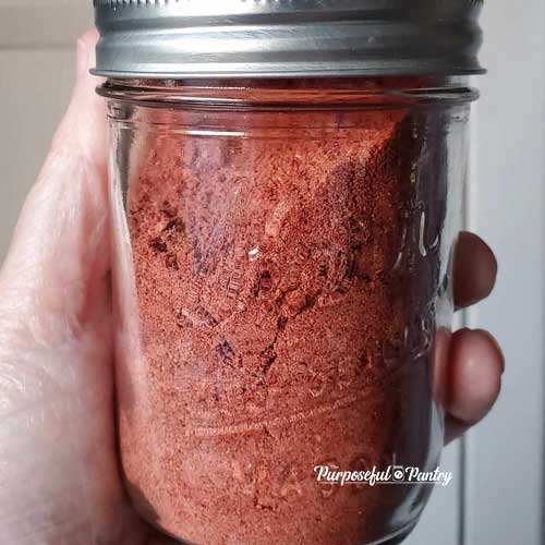 Mason jar of dehydrated strawberry powder