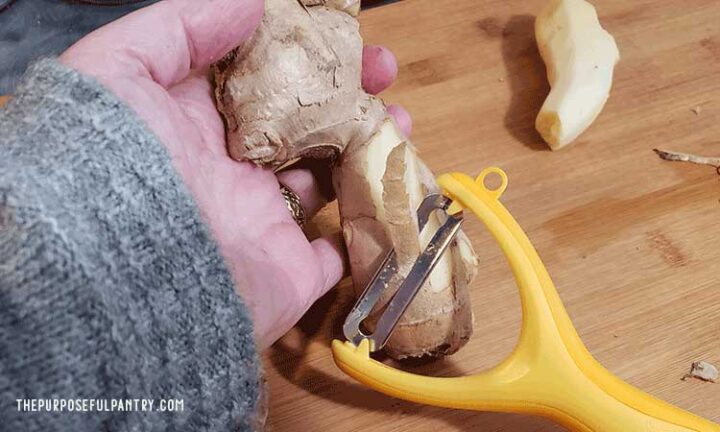Using a y-vegetable slicer to peel ginger for dehydrating