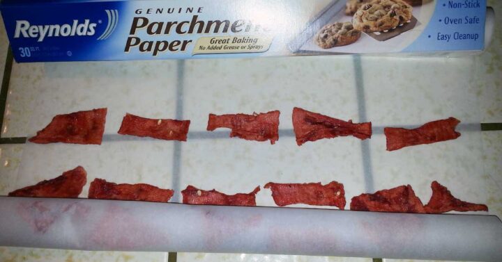 pieces of dried watermelon on parchment paper