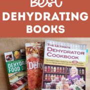 My favorite dehydrating cookbooks on a kitchen table with text overlay "The Best Dehydrating Books"