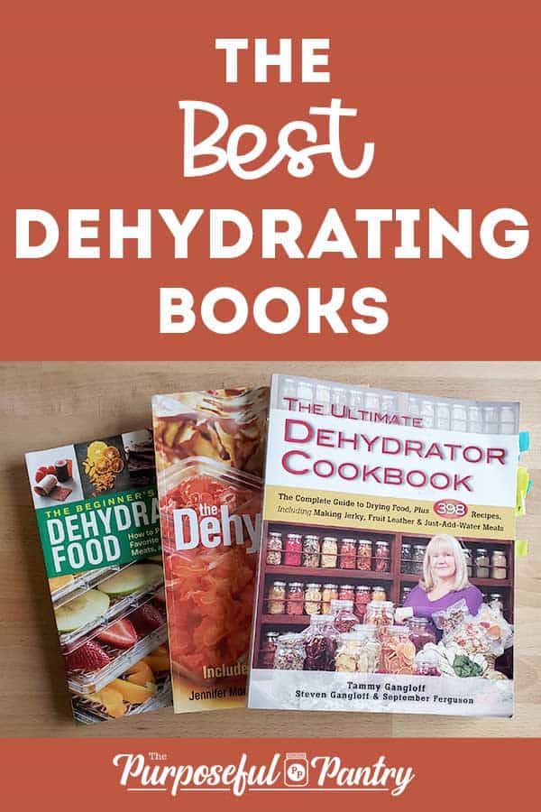 My favorite dehydrating cookbooks on a kitchen table with text overlay "The Best Dehydrating Books"