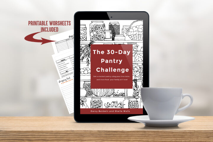 Tablet with the 30 Day Pantry ebook loaded and a cup of coffee