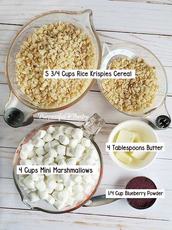 measuring cups of rice cereal, butter, mini marshmallows and blueberry powder to make Blueberry Rice Krispies Treats