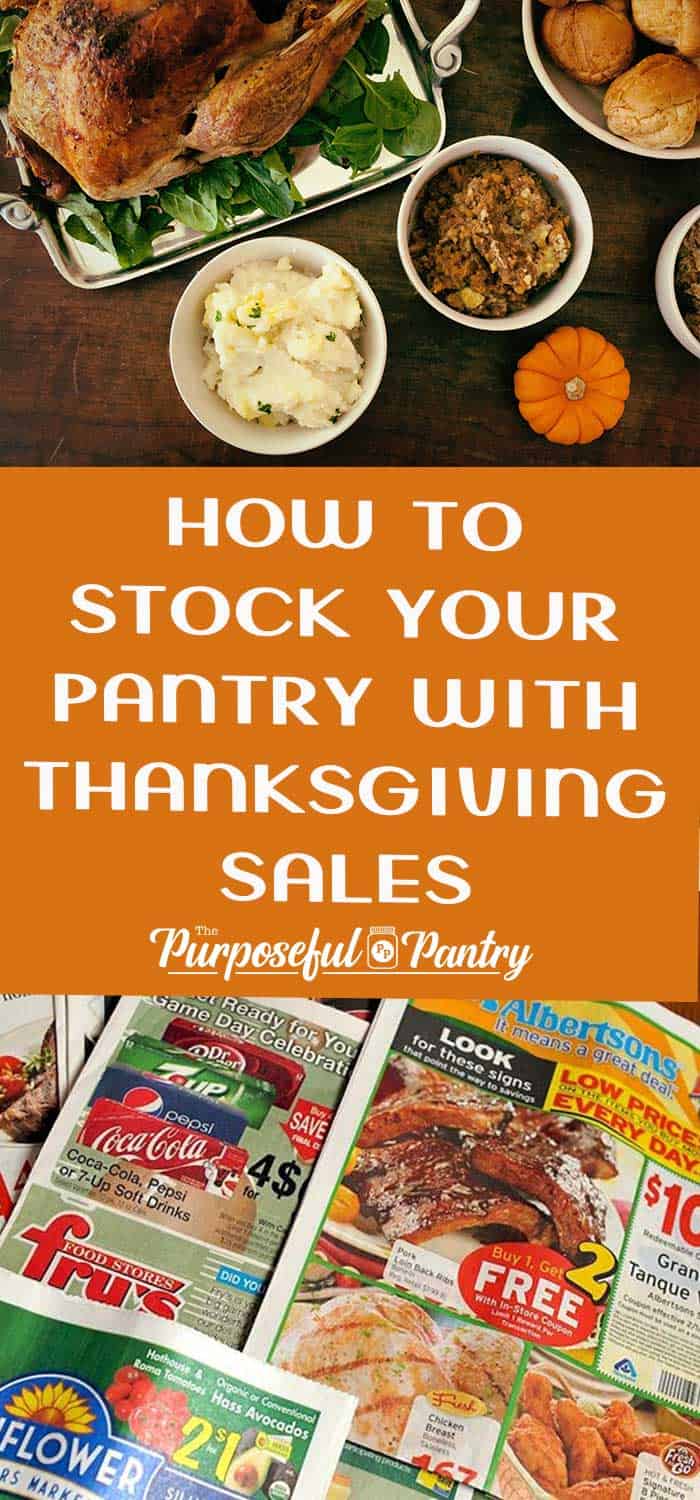 Thanksgiving feast on a table and sales circular from grocery stores