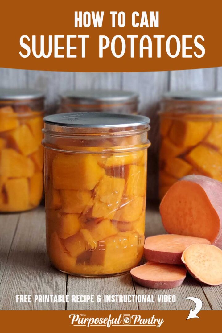 Mason jars of canned sweet potatoes on a wooden background