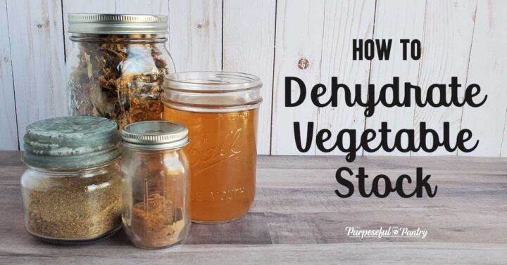 Jars of dehydrated vegeable broth and vegetables in various states on wooden background