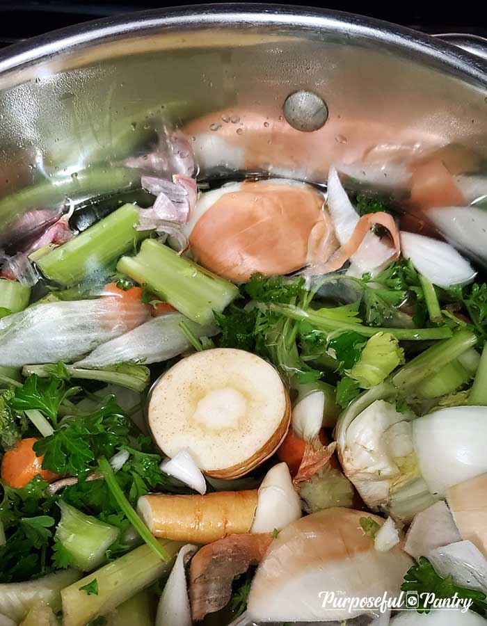 Stockpot of vegetables making broth