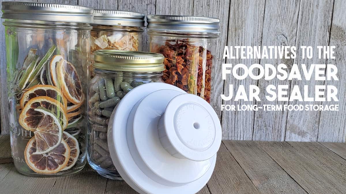 Dehydrated food in jars with a Foodsaver Vacuum Saler Jar Attachment on a wooden surface