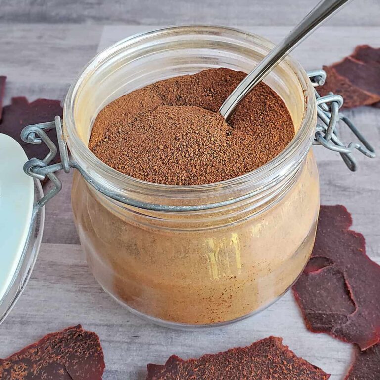 Tomato powder in a jar made from dehydrated tomato paste leather