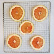 Grapefruit slices on a dehydrator tray.
