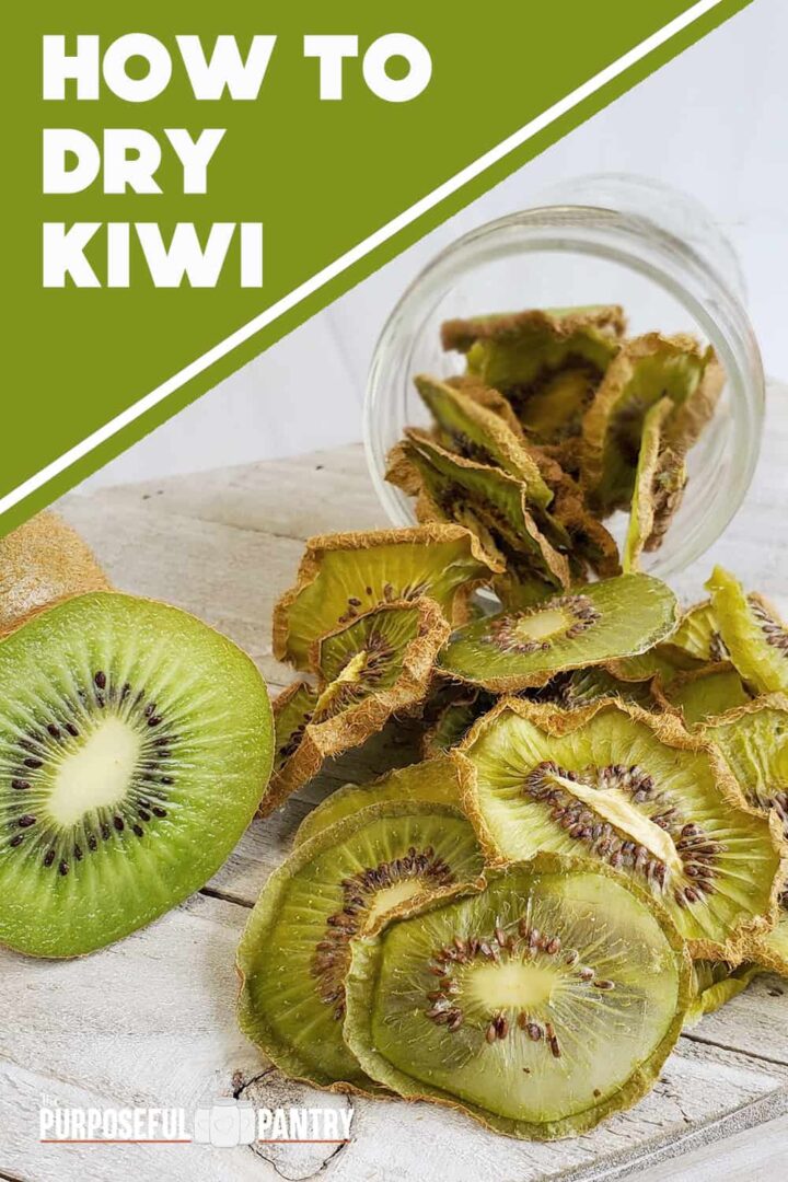 Fresh sliced kiwi with dehydrated kiwi slices falling out of a mason jar onto a white wooden surface