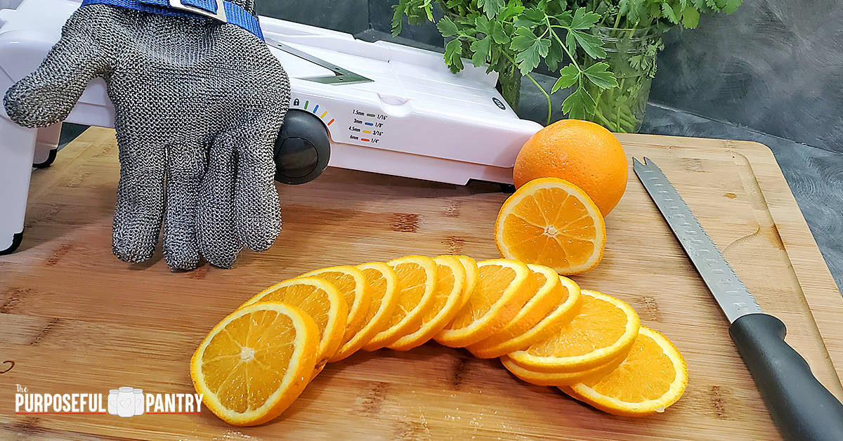 Oranges cut in slices with an OXO mandoline preparing for dehydrating