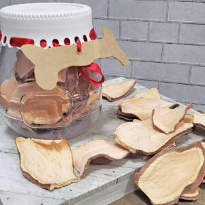 Clear container of dog chew treats made from sweet potatoes