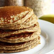Stack of pancakes on a white plate