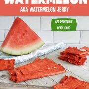 Watermelon slice with napkin and slices of dehydrated watermelon jerky