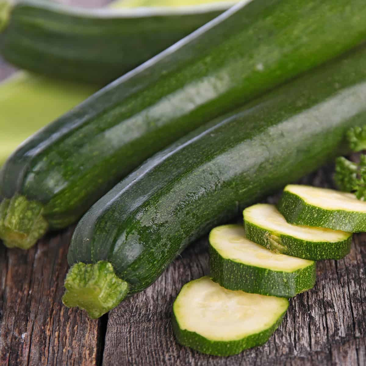 Green zucchini whole and sliced as a means of preserving zucchini