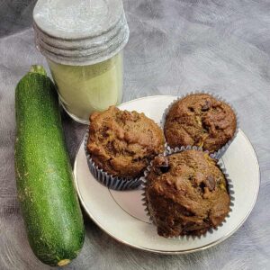 double chocolate zucchini muffins with zucchini and zucchini flour in a jar