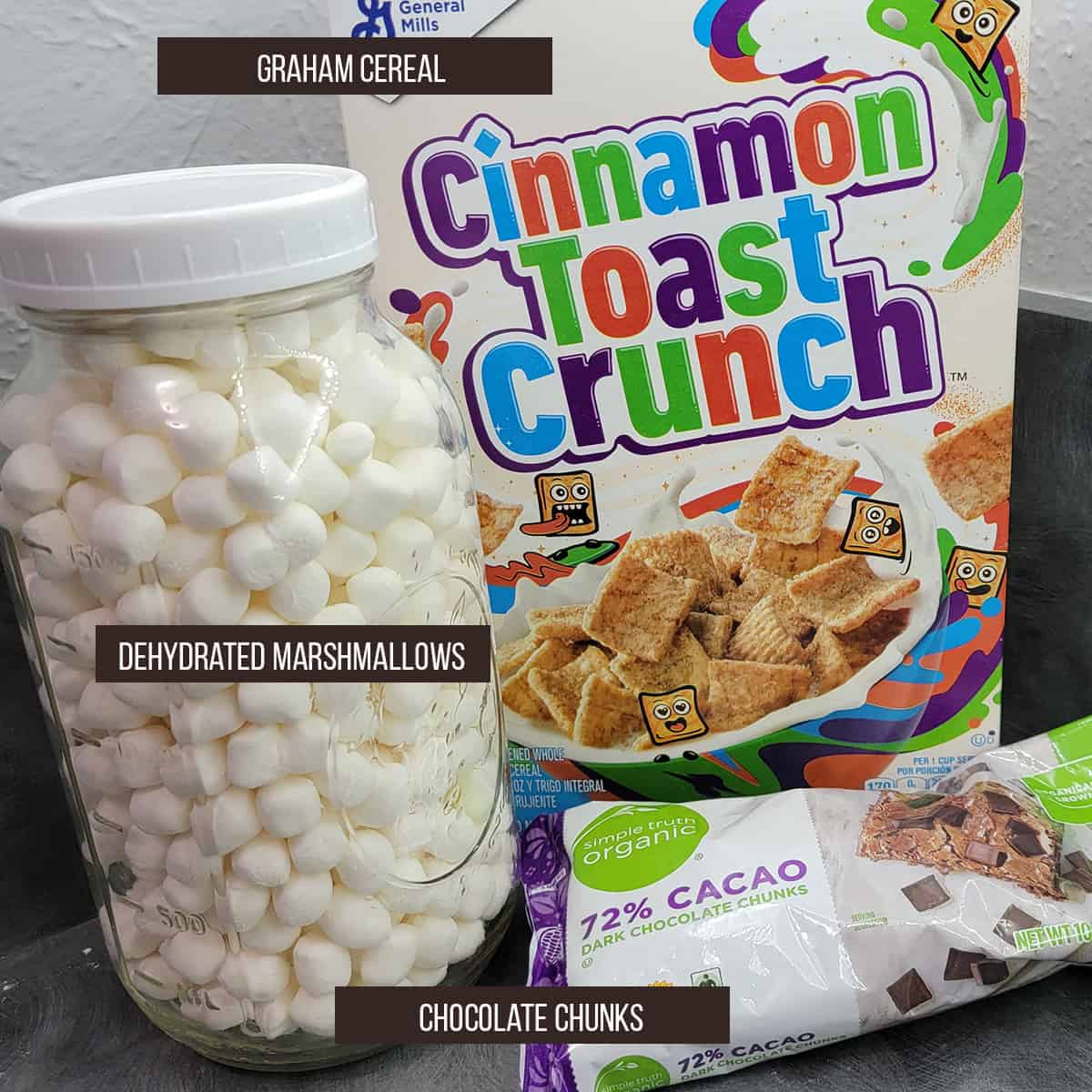 Ingredients for Crunchy S'more Mix: Dehydrated marshmallows, graham cereal and chocolate bits.