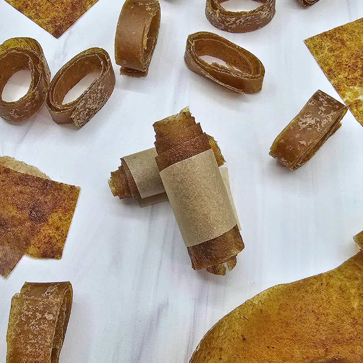 Easy apple pie fruit leather in rolls, sheets.