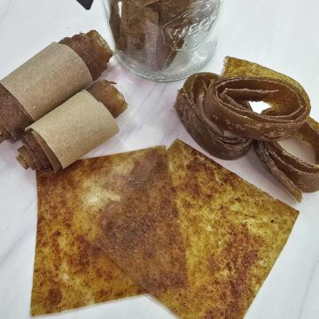 Easy apple pie fruit leather in sheets, rolls, and stored in a Weck jar.
