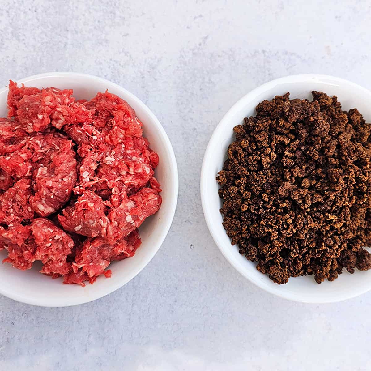 Bowl of raw ground beef (left) and one of dehydrated ground beef (right)