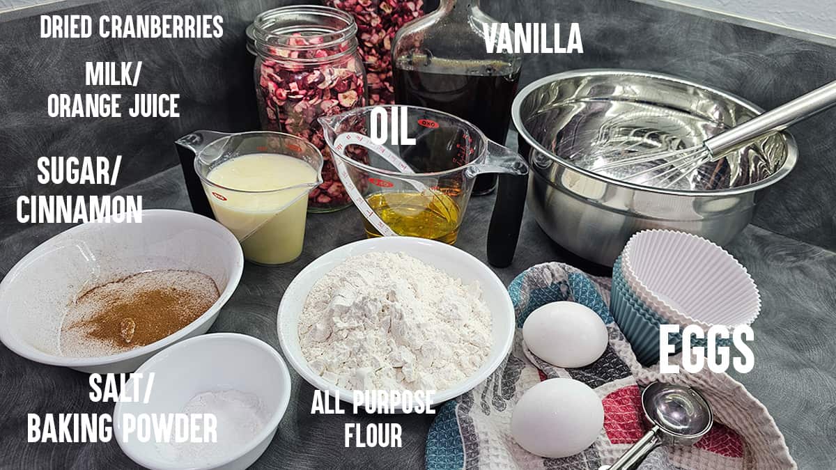 The ingredients for muffins are shown on a counter.