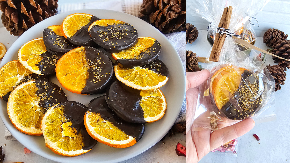 A plate with orange slices and pine cones on it.