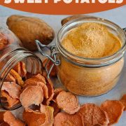 A jar of dehydrated sweet potato slices with a jar of sweet potato flour.