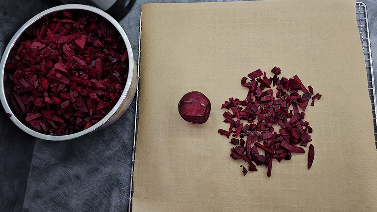 DIY red beet powder on a baking sheet.