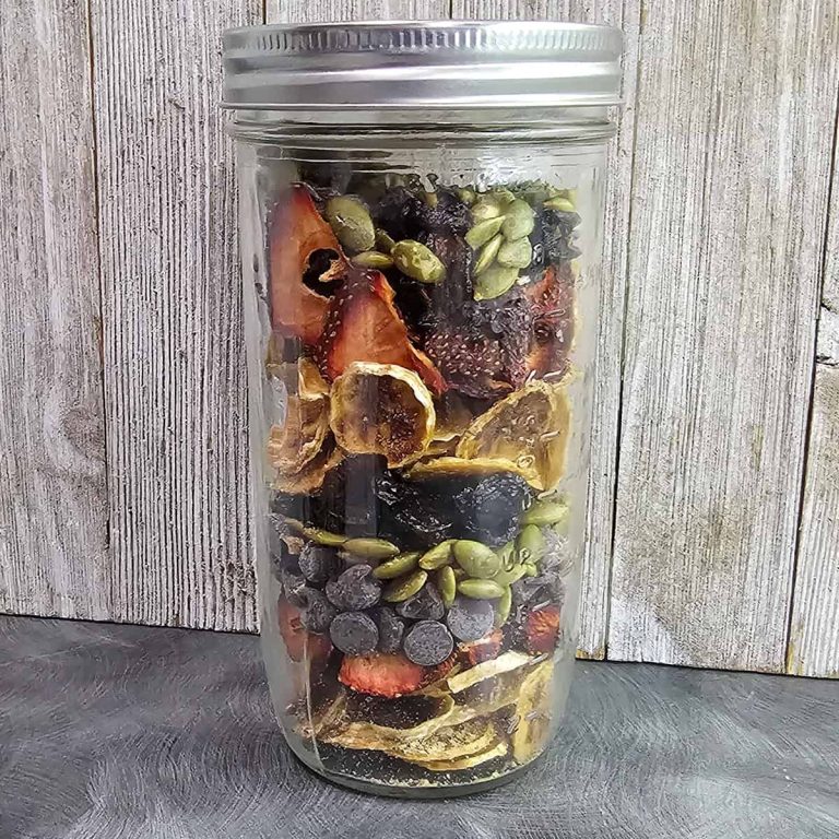 A jar of dried fruit and seeds.